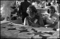 Thumbnail image of item number 1 in: '[Woman Working on Quilt]'.