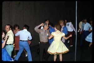 Primary view of object titled '[Dancing with Alamo Area Square Dancers]'.
