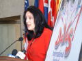 Photograph: [Ann Marie Weiss speaking at podium]