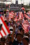 Photograph: [Immigration Protesters With American Flags and Signs]