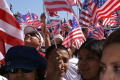 Photograph: [Immigration Protesters Wave American Flags]