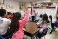 Primary view of [Delisse Hardy conducts class at Crockett Elementary]
