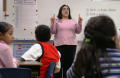Photograph: [Teacher addresses a class at Crockett Elementary School]