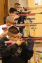 Primary view of [Air Rifle Team members practice for a tournament]