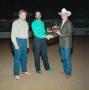 Photograph: [Three men in award presentation at Will Rogers Coliseum]