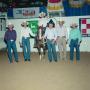 Thumbnail image of item number 1 in: '[Six people in rodeo arena at Will Rogers Coliseum]'.