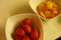 Primary view of [Bowls of red and yellow micro tomatoes]