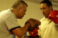 Photograph: [Boxing instructor with student]
