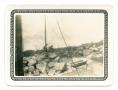 Photograph: [Photograph of a Man and Woman Standing on a Crane]