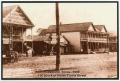 Primary view of [Postcard of a Historic Block in Cleveland, Texas]