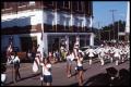 Photograph: [Photograph of a Drill Team at a Parade in Palestine, Texas]