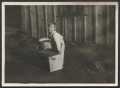 Primary view of [Unidentified Boy With Crate and Washtub]