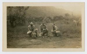 Primary view of object titled '[Joseph Kilgore Picking Fruit with Army Buddies]'.