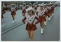 Primary view of [Clear Creek Cavaliers Performing in a Parade]