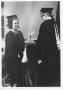 Photograph: Female Graduate Receiving Diploma from Joseph Rushing