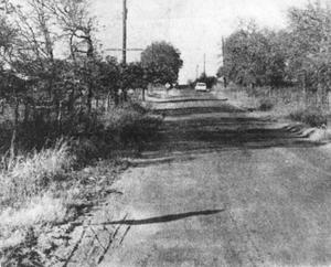 Primary view of object titled 'Precint Line Road, 1950'.