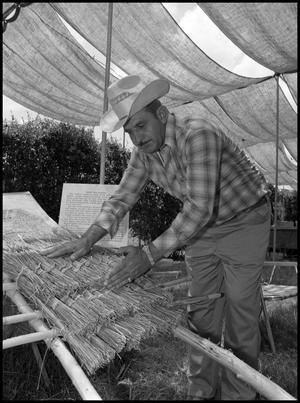 Primary view of object titled '[Juan Martinez, Roof Thatcher]'.