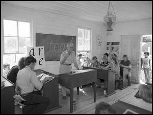 Primary view of object titled '[Gerry Doyle Teaching Handwriting in the One-Room School]'.