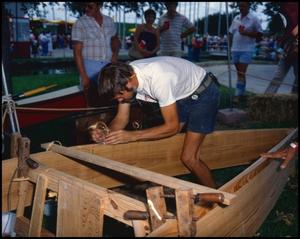 Primary view of object titled '[Rick Pratt Building a Boat at the Texas Folklife Festival]'.