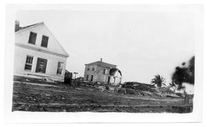 Primary view of object titled '[Photograph of Given's house and Seaside Hotel]'.