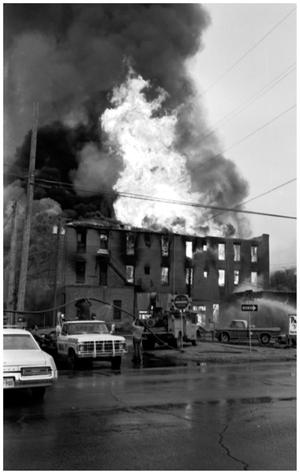 Primary view of object titled '[The Damron Hotel Fire, 4 of 21, Fire Inside the Structure]'.