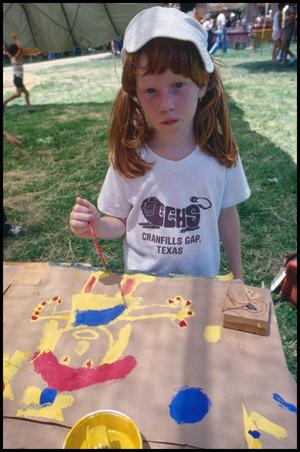 Primary view of object titled '[Girl Painting in Frontier Playland]'.