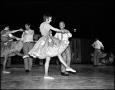 Photograph: [Woman in Petticoat Dancing with Partner]