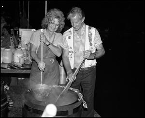 Primary view of object titled '[Cooks at Cajun Food Booth]'.