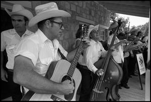 Primary view of object titled '[Lone Star Fiddlers Playing on the Porch of Frontier Fort]'.