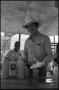 Photograph: [Man Serving Food in Perini Ranch Chuckwagon]