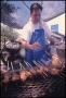 Thumbnail image of item number 1 in: '[Father Tom Grilling Souvlaki]'.