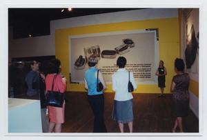 Primary view of object titled '[Teen Docent at Exhibition]'.