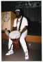 Primary view of [Adult Man with Drum at Salute to Youth Awards Program]