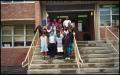 Photograph: [Gates Elementary Classroom on Front Steps]