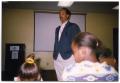 Photograph: [Joe Lewis Speaking to Children at Boys and Girls Club]