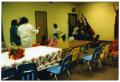 Photograph: [Children Breaking Piñata During Christmas Party]