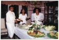 Photograph: [Links Women Standing at Food Table During Dorothy Washington Celebra…