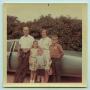 Photograph: [Tarver Family Posing with Car]
