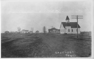 Primary view of object titled 'Rosenberg, Texas. White, wooden, church building with bell tower on right.'.