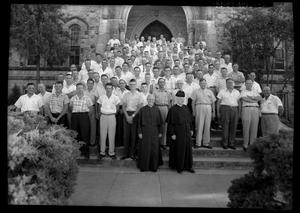 Primary view of object titled '[Men and Clergymen at St. Edward's University Retreat]'.