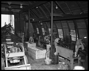 Primary view of object titled 'Men in mechanical workshop'.