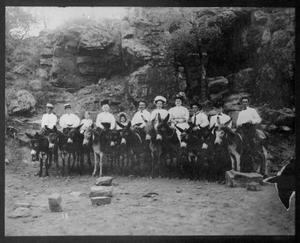 Primary view of object titled '[A group of people on mules.]'.