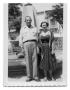 Photograph: Marie Burkhalter stands with a man in front of a fountain
