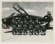 Primary view of [Photograph of Airmen in Front of Aircraft]