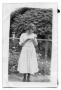 Thumbnail image of item number 1 in: 'Girl in a dress holding a doll'.