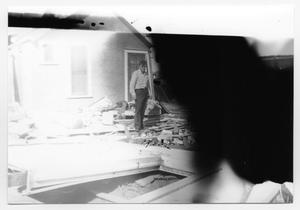 Primary view of object titled '[Photograph of a Man After a Tornado]'.