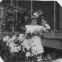 Primary view of [Katherine Elizabeth Griggs with Easter Lilies]