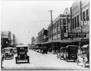 Primary view of object titled '[Early Street Scene in Orange, Texas]'.