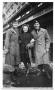 Photograph: Mary Ann Petsche with two uniformed men  in Paris