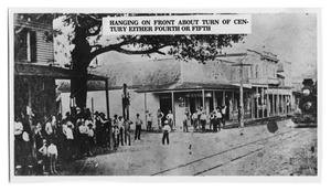 Primary view of object titled 'Hanging on Front Street in Orange, Texas'.